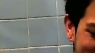 Amateur tattooed twink with a tan showers in classics porn