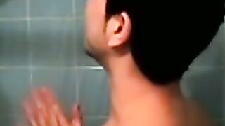 Amateur tattooed twink with a tan showers in classics porn