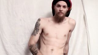 Horny twink York Reid having a long slow stroke on a bed