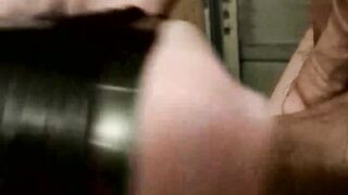 Horny Devin Reynolds slides the wet toy onto his massive meaty cock