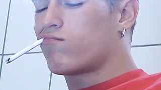 Attractive Yuri fires up his cig and sits on the toilet for his hot smokin and stroki