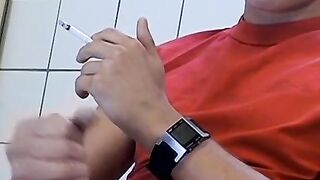 Attractive Yuri fires up his cig and sits on the toilet for his hot smokin and stroki