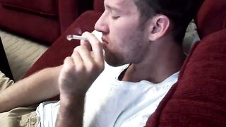 Puffing cig and cock jacking by horny Jake Parker
