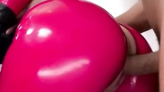 Busty girl in latex with blonde pigtails facialized by dom