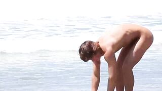 Brunette Justin Owen jerked his big cock at the beach