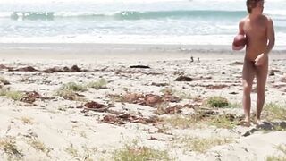 Brunette Justin Owen jerked his big cock at the beach