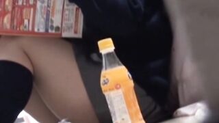 Japanese schoolgirl reads a comic book and masturbates