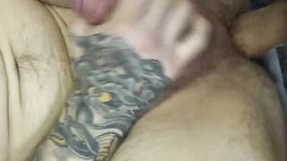 Heavily inked military man masturbates while barebacked
