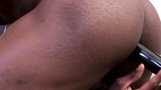 Ebony gay man is jerking off while toying his tight asshole