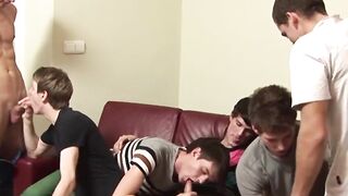 Twinks are sucking and fucking each other in bareback orgy