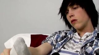 Stunning Tyler Bolt plays with his naked feet and sucking his toes