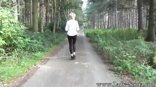 Lady Sonia flashing then masturbates inside the forest