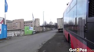 sexy Blonde Pees Between 2 Buses