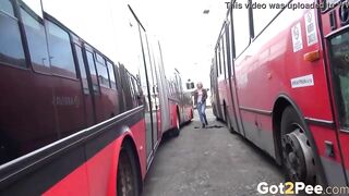 sexy Blonde Pees Between 2 Buses