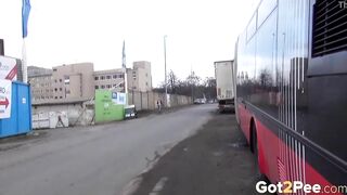 sexy Blonde Pees Between 2 Buses