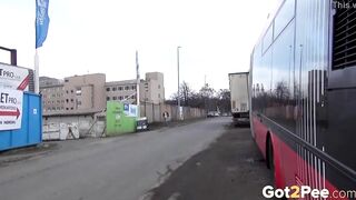 sexy Blonde Pees Between 2 Buses