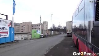 sexy Blonde Pees Between 2 Buses
