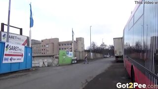 sexy Blonde Pees Between 2 Buses