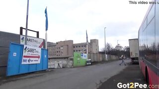 sexy Blonde Pees Between 2 Buses
