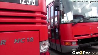 sexy Blonde Pees Between 2 Buses