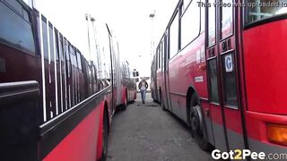 sexy Blonde Pees Between 2 Buses