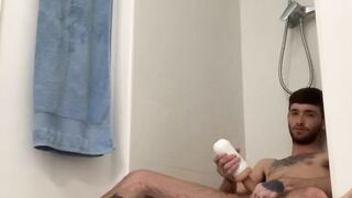 Amateur records himself using fleshlight in the bathroom