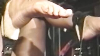 Busty blonde sub tied up for spanking in BDSM dungeon