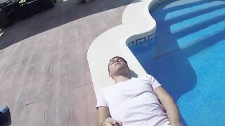 Young amateur strokes his dick and cums loads by the pool