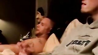 Two amateur freaks jerk off together in a cheap motel room