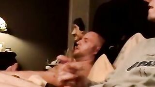 Two amateur freaks jerk off together in a cheap motel room