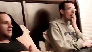 Two amateur freaks jerk off together in a cheap motel room