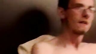 Two amateur freaks jerk off together in a cheap motel room