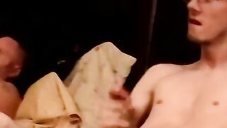 Two amateur freaks jerk off together in a cheap motel room