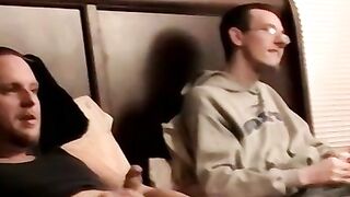 Two amateur freaks jerk off together in a cheap motel room