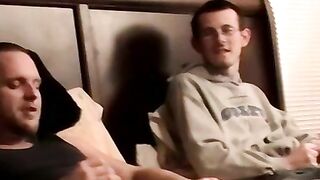 Two amateur freaks jerk off together in a cheap motel room