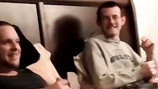 Two amateur freaks jerk off together in a cheap motel room