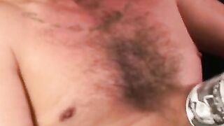 Hairy stud strips during interview and tugs on his hard dick