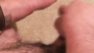 Hairy stud strips during interview and tugs on his hard dick
