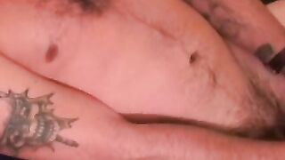 Hairy stud strips during interview and tugs on his hard dick