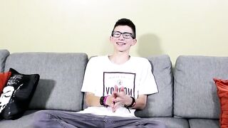 Twink with glasses interviewed before jerking himself off