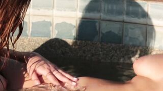 Two charming teens have steamy lesbian session in the pool