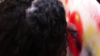 Sexy shemale Bella Rosari takes two dicks in a gloryhole