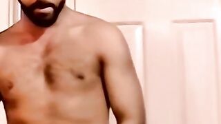 Young amateur strokes his cock and receives a helping hand