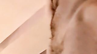 Young amateur strokes his cock and receives a helping hand