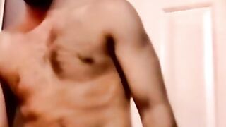 Young amateur strokes his cock and receives a helping hand