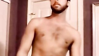 Young amateur strokes his cock and receives a helping hand