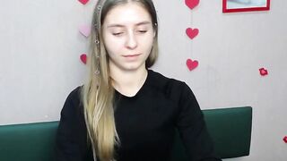 Blonde amateur babe TaliaSunshin strips to red panties and poses on webcam