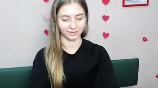 Blonde amateur babe TaliaSunshin strips to red panties and poses on webcam