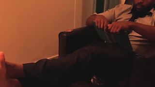 Bearded Dallas shows off his perfect warm feet while reading a hot story