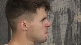 Wax tormented slave Dmitry Osten endures rough blowjob